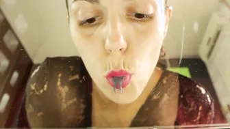 Giantess Julia V Earth is eating small man