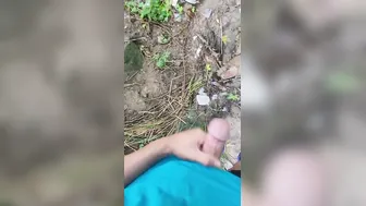 Brazilian daddy masturbating into outdoor