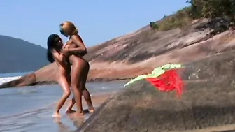 Lesbian Paradise - Two Hot Babes Explore Their Passion on an Exotic Beach