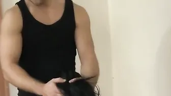 Shackled and blowing a gigantic penis