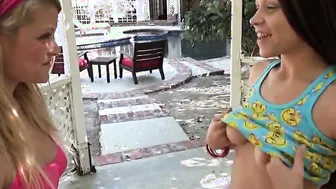 Little Taylor is playing with her brunette friend outdoors as lesbiasn