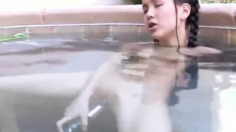 Tiny Tabby Masturbating her pussy using dildo at the pool
