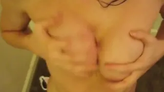 Tiny Red Slut rubbing tits closeup horny