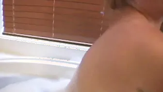 Barbi showing her big tits with bubble bathtub