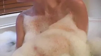 Barbi showing her big tits with bubble bathtub 2