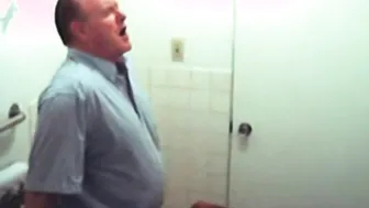 Bathroom slut sucks dick in restroom