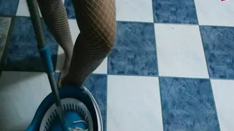 Asian cleaning lady masturbates in fishnet stockings with a dildo