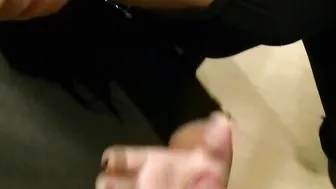 Kinky black haired teen secretly gives a blowjob in a changing room