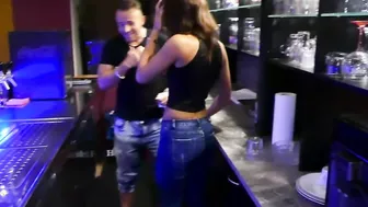 Black haired bartender gets fucked behind the counter