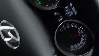 German blonde gives a blowjob in a car on the highway