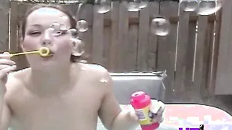 Sweet teen showing her small tits and pussy in jaccuzi