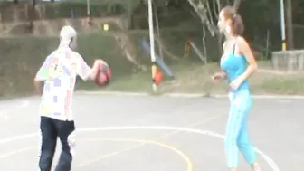 Paris Milan plays basketball outdoors