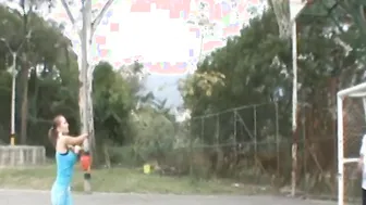 Paris Milan plays basketball outdoors