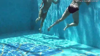 Jessica and Lindsay swim nude inside the pool