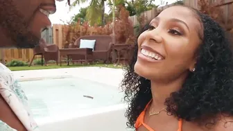 Olivia Jay blows a gigantic ebony penis by the pool