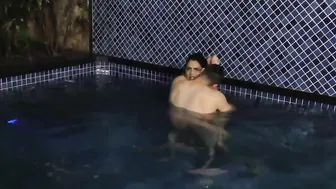 Voluptuous Shemale Sabrina Sousa and a Guy Make Out in a Swimming Pool
