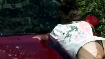 Cute rain gets wet washing car with lesbo