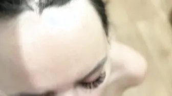 Lady in glasses teases her eager fans