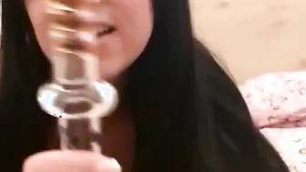 Dark haired Chloe James drills her pussy with big dildo