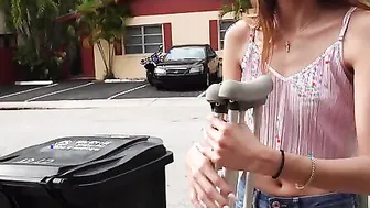 Standing on the street corner with crutches and a sign begging for help Natalia Nix