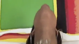 Gigantic butt black bitch getting covered into oil before anal sex