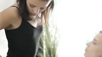 Sensual young lesbians slowly finger each others pussy