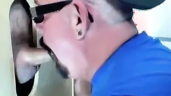 Dude getting a blowjob from an expert sucker in a gloryhole
