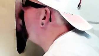 Horny dude with glasses enjoys in a glory hole scene
