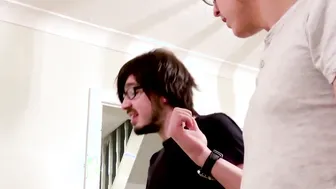 Curvy slut blowing two nerd producers dicks