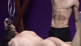 Handsome young gay enjoys bondage and hardcore wax torment