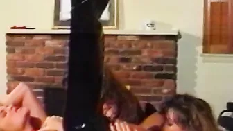 Busty babe ass dildoed while licking pussy in lesbo threeway