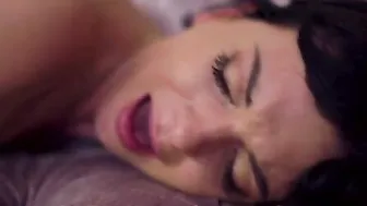 A simple dress with a miniskirt and a deepthroat cut neckline outline the thin curves that Monika Benz is so