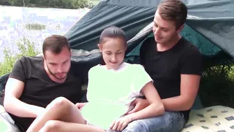 Naughty teen shared by two dicks during a camping trip