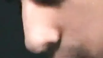 Zack unzips his pants and starts to massage his cock