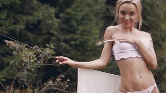 Petite blonde model shows sexy body