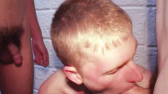 Young blond guy sucks two hard dicks in the army