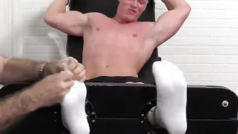 Hunky dude Seamus strapped and tickled on the tickle chair