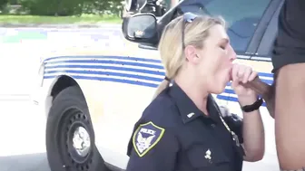 Busty police officers IR banged in the middle of the street