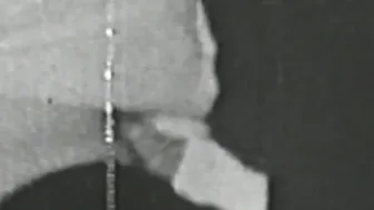 Black and white vintage video of lady sucking her lover
