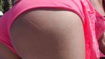 Big breasted cougar fooling around at the pool