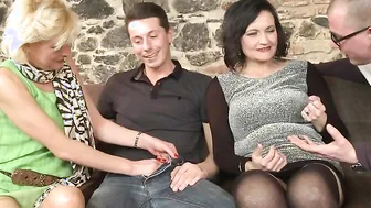 Two guys fucking three mature sluts in a groupsex session