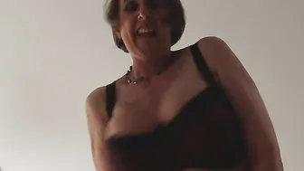 Horny British mature woman playing with her unshaved pussy and her round natural tits