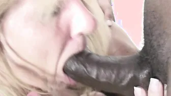 Kinky mama munching on a bunch of black cocks