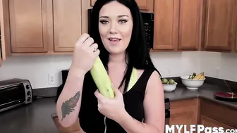 Voluptuous glam girl is naked and toys pussy with a cucumber