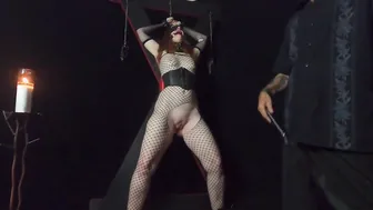 Red Head milf Bound to St. Andrews Cross and Brought to Orgasm.