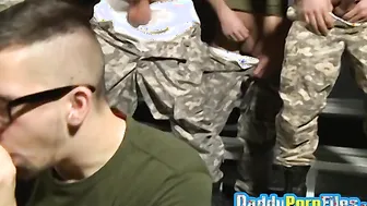 Hunks line up for a raw gay blowjob from young army rookie