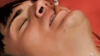 Dark haired Kevin masturbates after pushing dildo in own ass