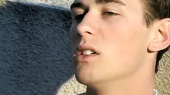 Slender Shane shows off his penis while on the balcony
