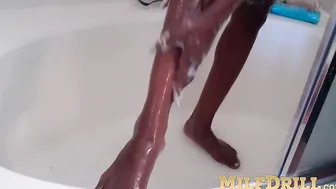 Adorable mature woman is all wet and horny under the shower