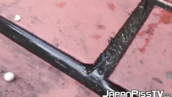 Japanese teens having fun peeing in public